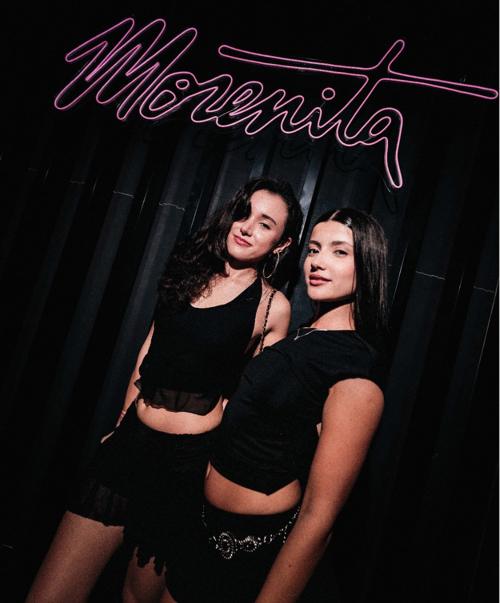 La Morenita neon sign at the venue